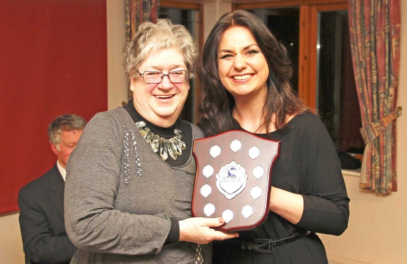 Barbara Kettel receiving The Eynesbury Shield on behalf of Hansford Branch from Heidi Allen MP at the South Cambridgeshire Conservative Association's 2018 AGM.
