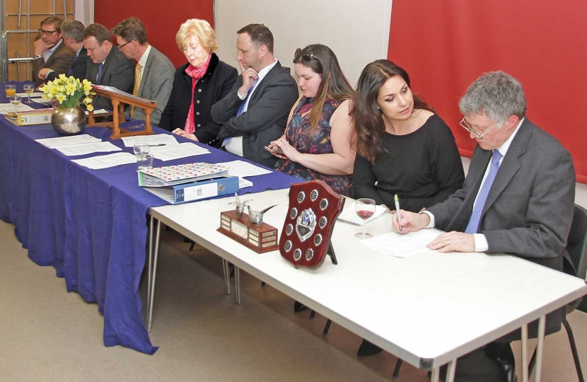 The top table at the South Cambridgeshire Conservative Association's 2018 AGM.  Left to right: James Palmer, Mayor of Cambridgeshire and Peterborough Combined Authority; Jason Ablewhite, Police and Crime Commissioner for Cambridgeshire; Tom Bygott, Area Chairman; Mark Roberts CCHQ; Dorothy Calder MBE, SCCA President; Ben Shelton, SCCA Chairman; Heather Williams, SCCA Deputy Chairman, Political; Heidi Allen, MP for South Cambridgeshire; Joshua Vanneck, standing in for Nick Heath, Treasurer.