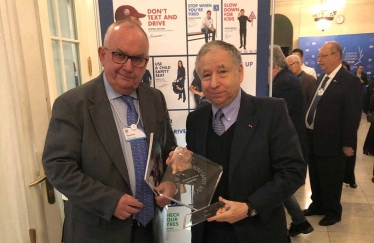 Grenville Chamberlain congratulates Jean Todt, president of the FIA on being given the Prince Michael of Kent Award for Road Safety.