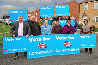 Conservative councillors and activists supporting more houses for local people in South Cambs – like the small development in Home Close, Swavesey where 20 council houses were built in 2016.  L to R back row: activists David Perkins, Sujit Bhattacharya and Colin Barker, Cambourne District Councillor Ruth Betson, activist Jason Butcher and Girton District Councillor Tom Bygott.  Front row: County and District Councillor Mark Howell, Caxton & Papworth District Councillor Nick Wright, Bar Hill District Council